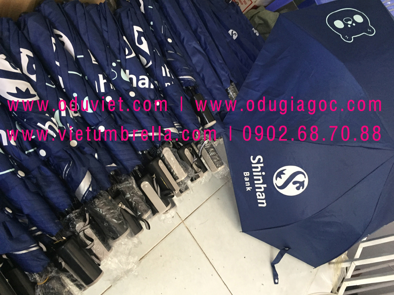 xưởng sản xuất ô dù cầm tay in logo quảng cáo